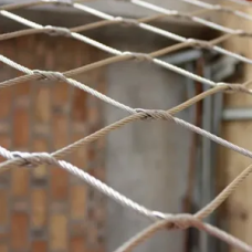 Сетка нержавеющая тросовая с узловым креплением и ромбической ячейкой Н7 7х7 AISI 316 20х35х1 мм